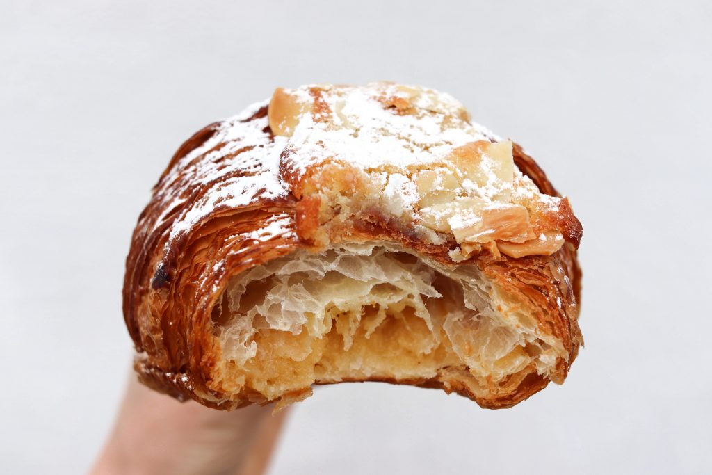 almond croissant - yeast bakery London